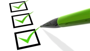 Checklist with green checkmarks in boxes