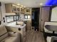 Living area and rear kitchen inside the Grey Wolf 26SS