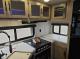 Entertainment center and fireplace in the Grey Wolf 26SS