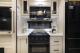 Kitchen range and surrounding cabinets in 2027 Cherokee Sabre 32RL