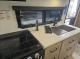 Kitchen sink and cooktop in 2027 Flagstaff Micro Lite 22FBS