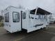 Alpha Wolf 26RL Travel Trailer campside slide view