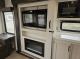 Alpha Wolf 26RL Travel Trailer hidden pantry fireplace