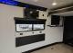 Wall mounted television in 2027 Cherokee Wolf Pack 25-14 garage