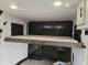 Raised bunk in toy hauler garage of 2027 Cherokee Wolf Pack 25-14