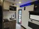 Kitchen and entry area in 2027 Cherokee Wolf Pack 25-14