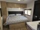 Front bedroom and bed in 2027 Cherokee Grey Wolf 21AB