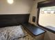 Bedside window and nightstand in 2027 Cherokee Grey Wolf 21AB