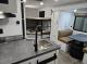 Kitchen sink dining area and rear bunks in 2027 Modern Buggy Hopper 3