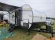 Front passenger side exterior with awning on 2027 Modern Buggy Hopper 4 travel trailer