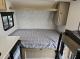Flagstaff E Pro 131BLE interior bed and overhead cabinets