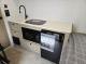 Flagstaff E Pro 131BLE kitchenette with sink and refrigerator