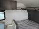 Forest River Acclaim 16BH bed and overhead cabinets