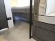 Forest River Acclaim 16BH lower bunk and dinette storage