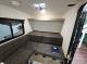 2027 Flagstaff E Pro 11LE interior lounge seating beneath windows