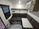 2027 Flagstaff E Pro 11LE dinette with table and wall-mounted air conditioner
