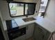 2027 Forest River Acclaim 26RB kitchen sink, cooktop, and countertop