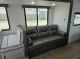 2027 Forest River Acclaim 26RB jackknife sofa beside panoramic windows