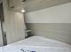 2027 Forest River Acclaim 26RB queen bed with overhead cabinets