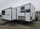 Rear driver side exterior with slide out on 2027 Longitude 285BH