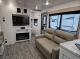 Living room sofa and fireplace in 2027 Longitude 285BH