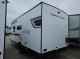 Rear driver side exterior of 2027 Longitude 160MRBLE