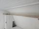 Murphy bed upper trim detail in 2027 Longitude 160MRBLE