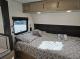 Wolf Pup 17JWBL Travel Trailer interior bed and window