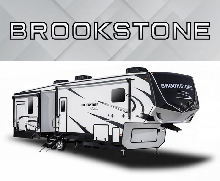 Photo of Coachmen Brookstone fifth wheel with logo above.