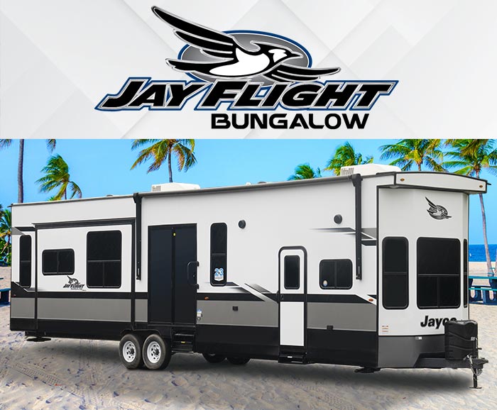 Photo of Jayco Jay Flight Bungalow park model trailer on beach with logo above.