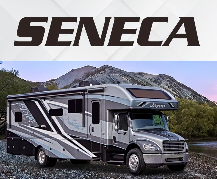 Photo of Jayco Seneca Super C motorhome with mountains in background and logo above.