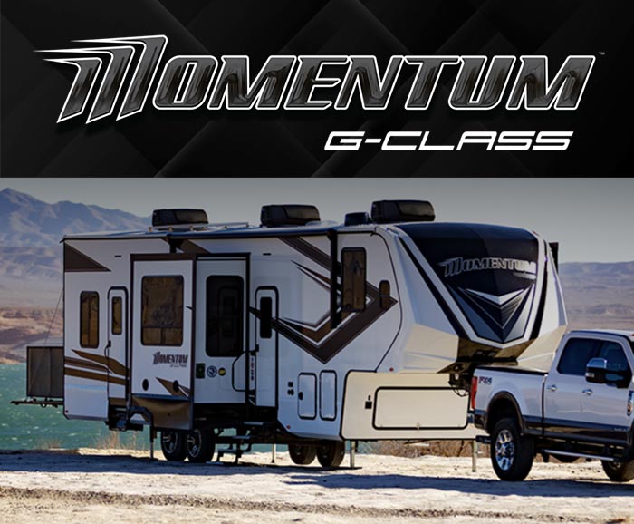 Photo of Momentum G-Class fifth wheel toy hauler with logo above.