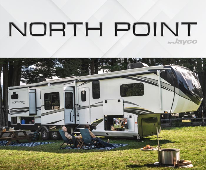 Photo of Jayco North Point fifth wheel with logo above. 