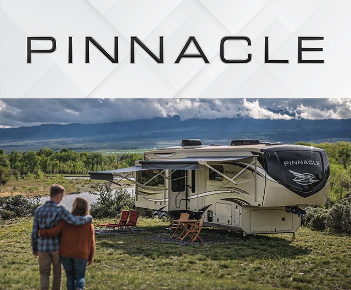 Photo of Jayco Pinnacle fifth wheel with logo above.
