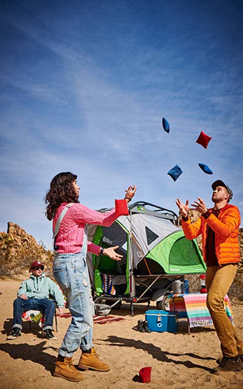 Couple camping in their popup camper.